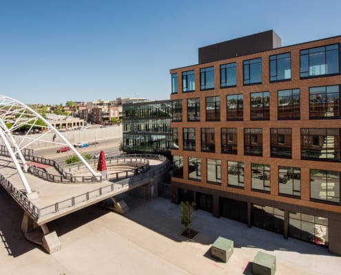 Extfin_CO_Office_Circa_buildingwithbridge
