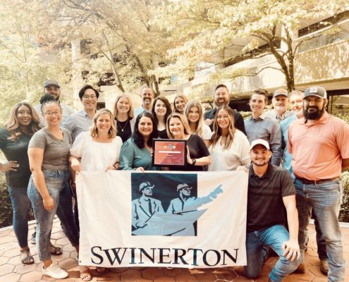Atlanta Swinerton Employees Holding Best Place to Work Plaque