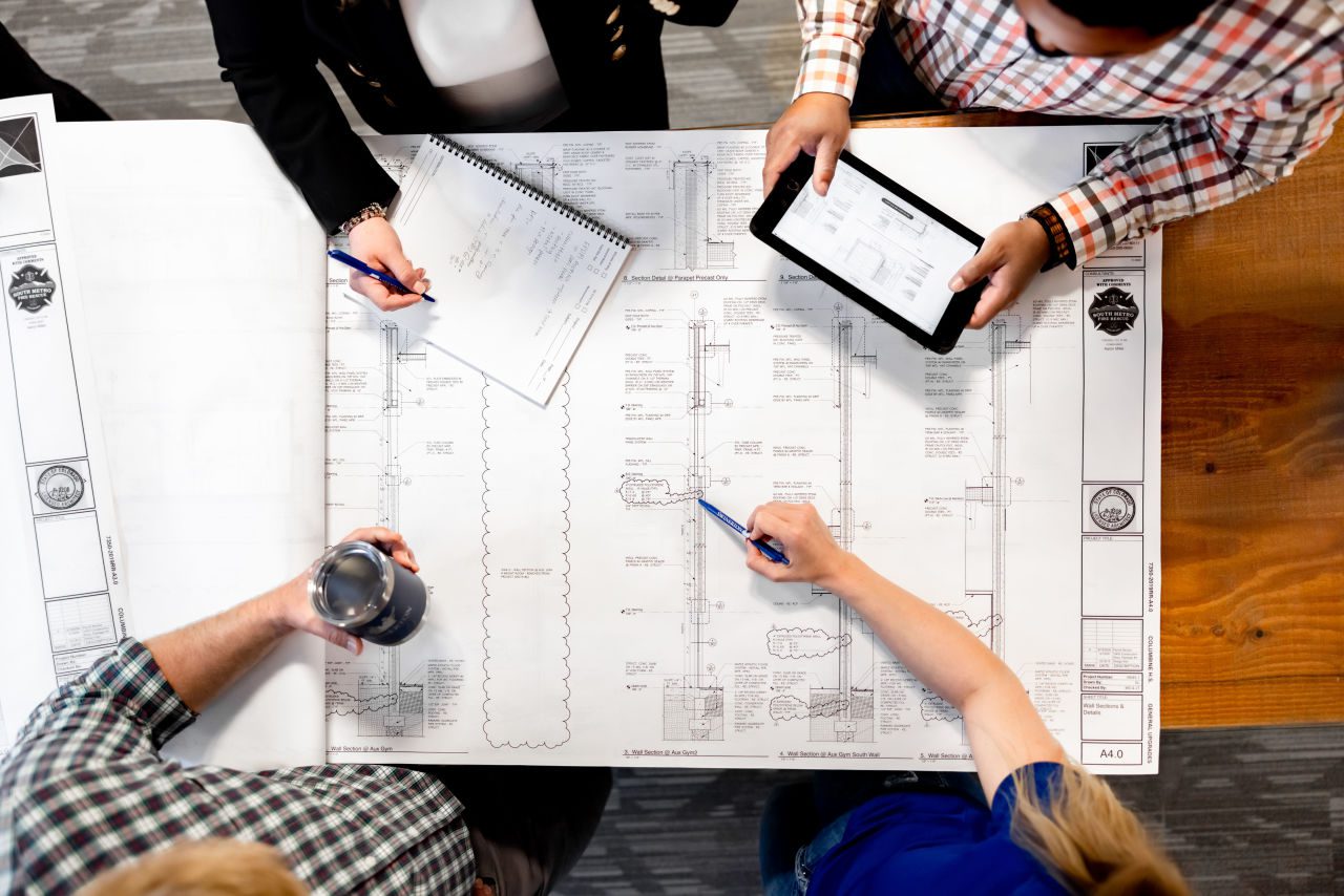 Swinerton-construction-company Construction Company National General contractor working with plans