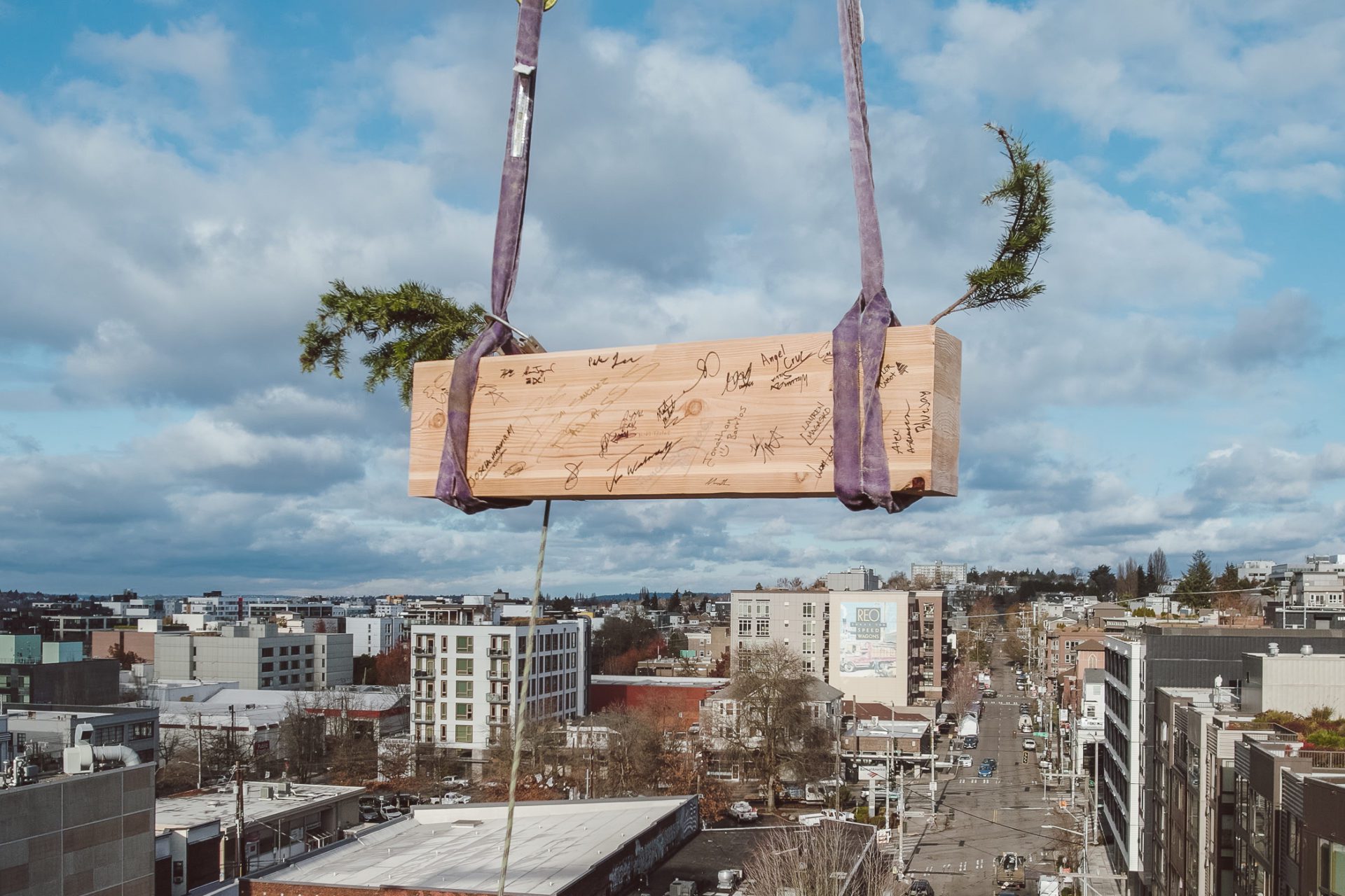 heartwood_toppingout-seattle-washington Last wood beam for heartwood, First Mass Timber Middle-Income Housing Development in U.S. being raised.